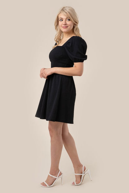 Black Mini Puff sleeved smocked dress