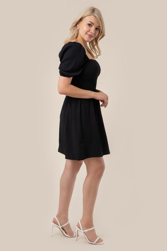 Black Mini Puff sleeved smocked dress